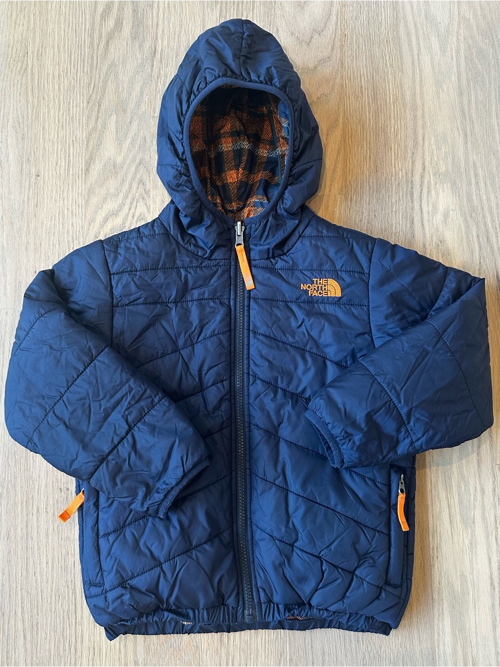 The North Face Boys Navy Reversible Hooded Puffer with Orange Accents Size 6